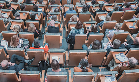 Students sitting in university lecture hall