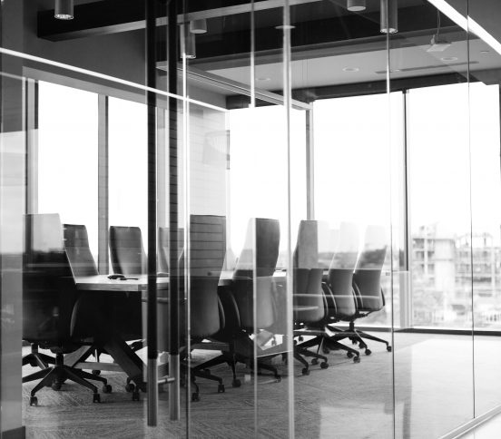 Monochrome meeting room in high rise building